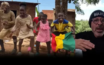 Fabio Zambrana y los niños de Nansana Kids en una producción en el que resalta la Bandera boliviana